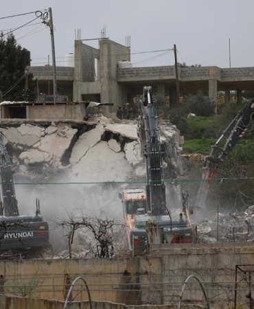 Soykırımcı İsrail, 2026'nın başından beri Batı Şeria'da Filistinlilere ait 312 yapıyı yıktı