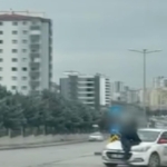 Tartışma sonrası aracın kaputunda metrelerce sürüklendi