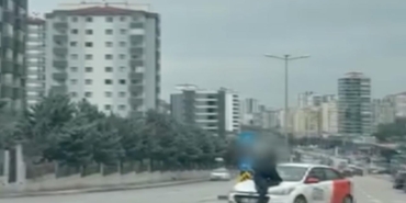 Tartışma sonrası aracın kaputunda metrelerce sürüklendi
