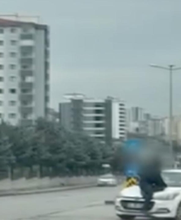 Tartışma sonrası aracın kaputunda metrelerce sürüklendi